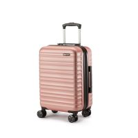 Maleta de mano rígida color oro rosa de Amazon Basics, con diseño elegante y 4 ruedas giratorias