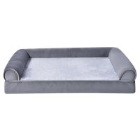 Cama para mascotas estilo sofá en color gris con superficie suave, ideal para perros
