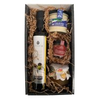 Cesta gourmet que incluye aceite de oliva virgen extra, crema de queso, paté ibérico y mermelada de Deliex, presentación en caja decorativa.