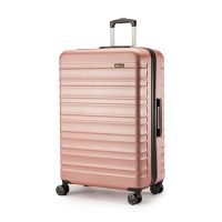 Maleta rígida de Amazon Basics en color oro rosa con diseño moderno y 4 ruedas giratorias, ideal para viajes.